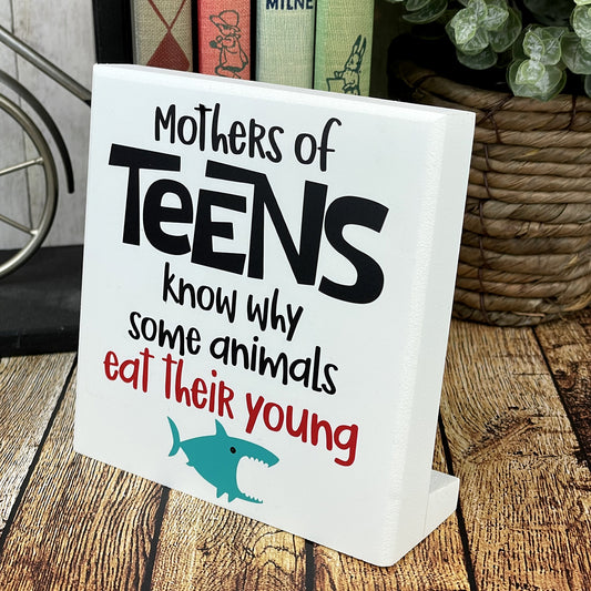 Mothers Of Teens Know Why Some Animals Eat Their Young — Funny Desktop Sign — Sarcastic Parenting